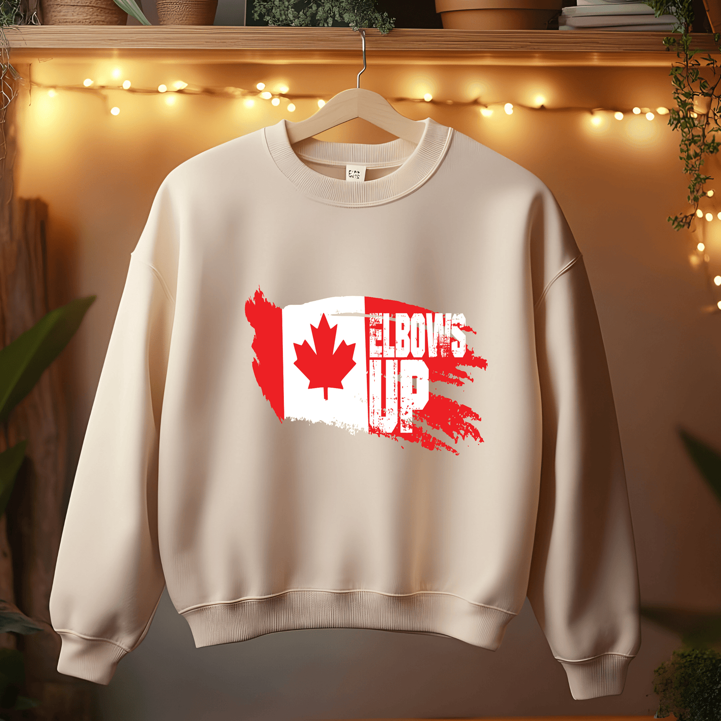 Ink and Charms Designs Sweatshirt "ELBOWS UP" Apparel Collection: Wear Your Canadian Pride with Strength!