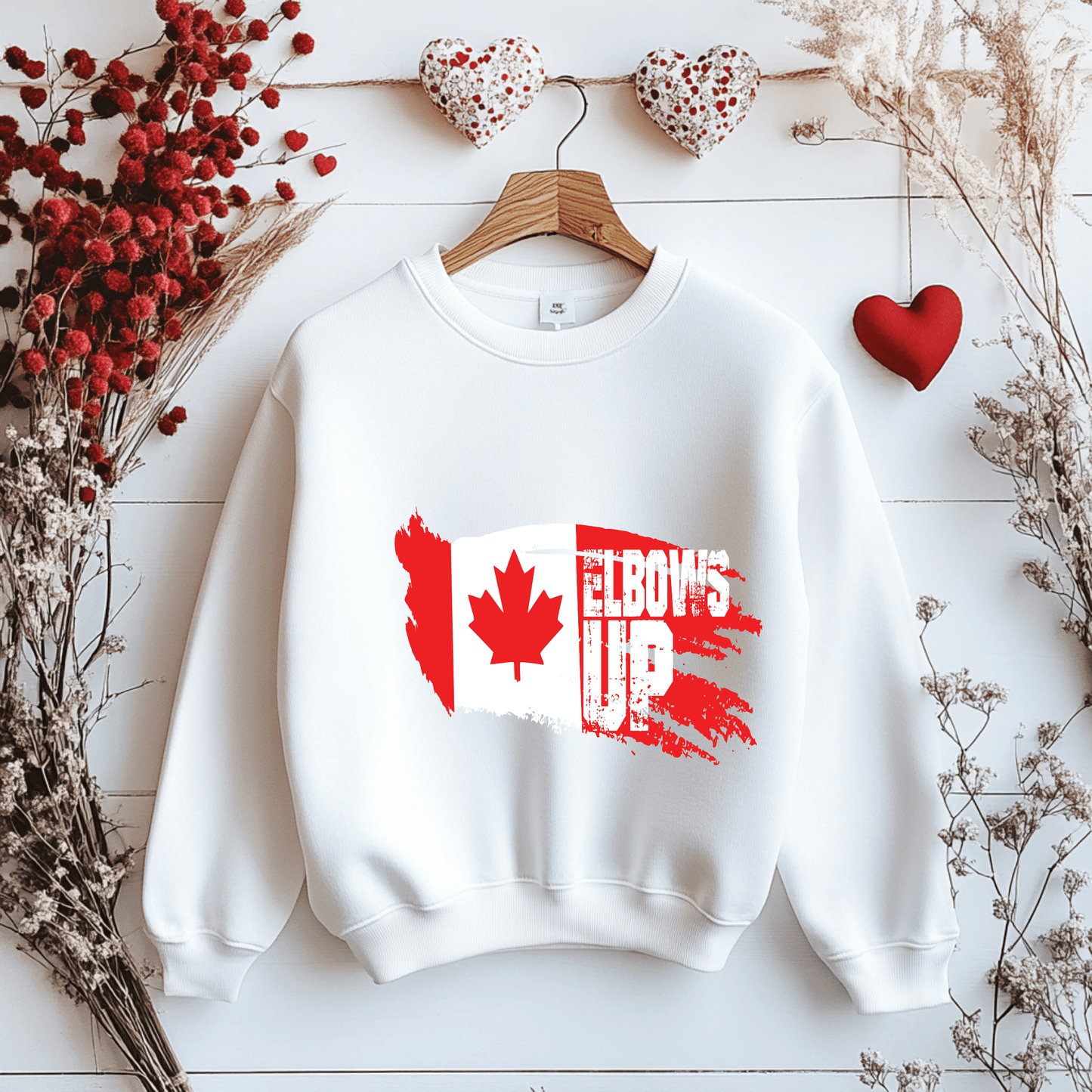 Ink and Charms Designs Sweatshirt "ELBOWS UP" Apparel Collection: Wear Your Canadian Pride with Strength!
