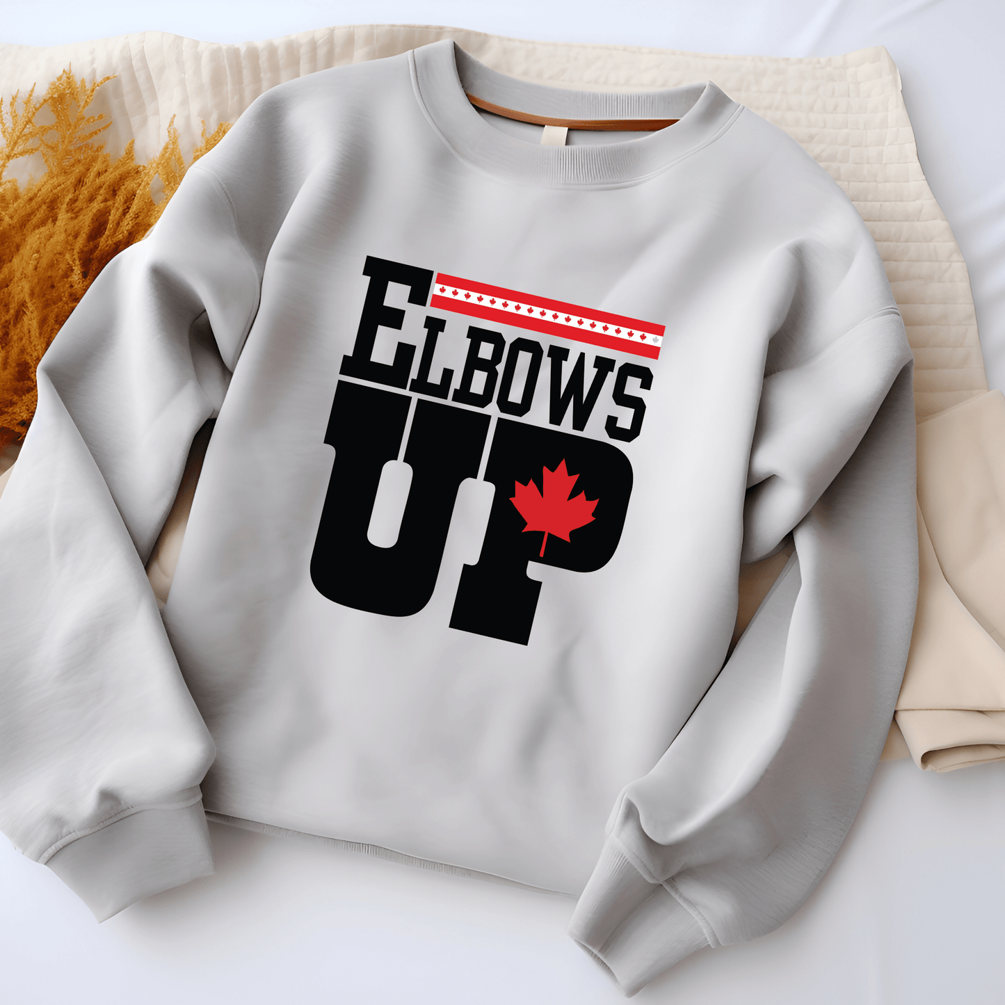 Ink and Charms Designs Sweatshirt "ELBOWS UP" Apparel Collection: Wear Your Canadian Pride with Strength!