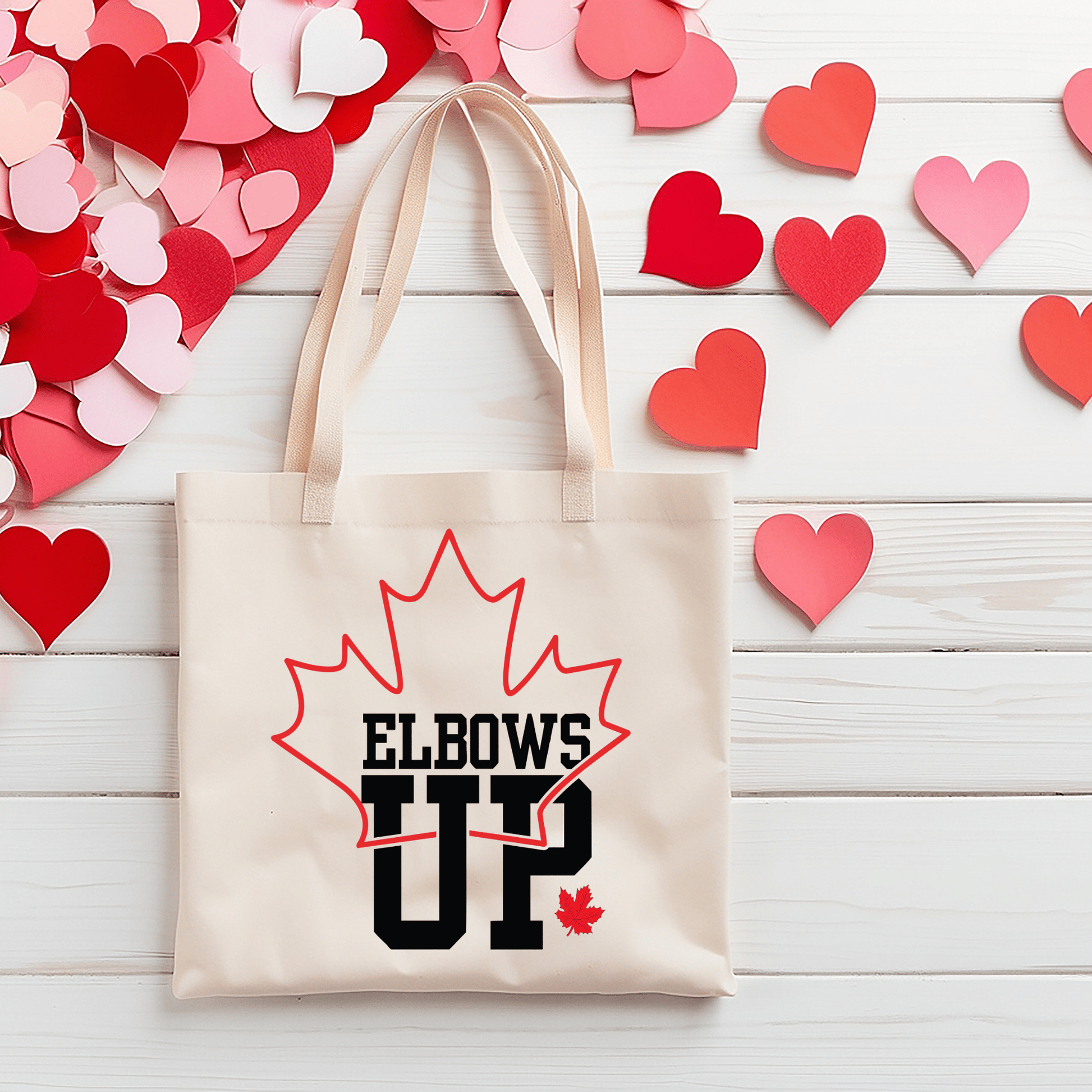 Ink and Charms Designs Sweatshirt "ELBOWS UP" Apparel Collection: Wear Your Canadian Pride with Strength!