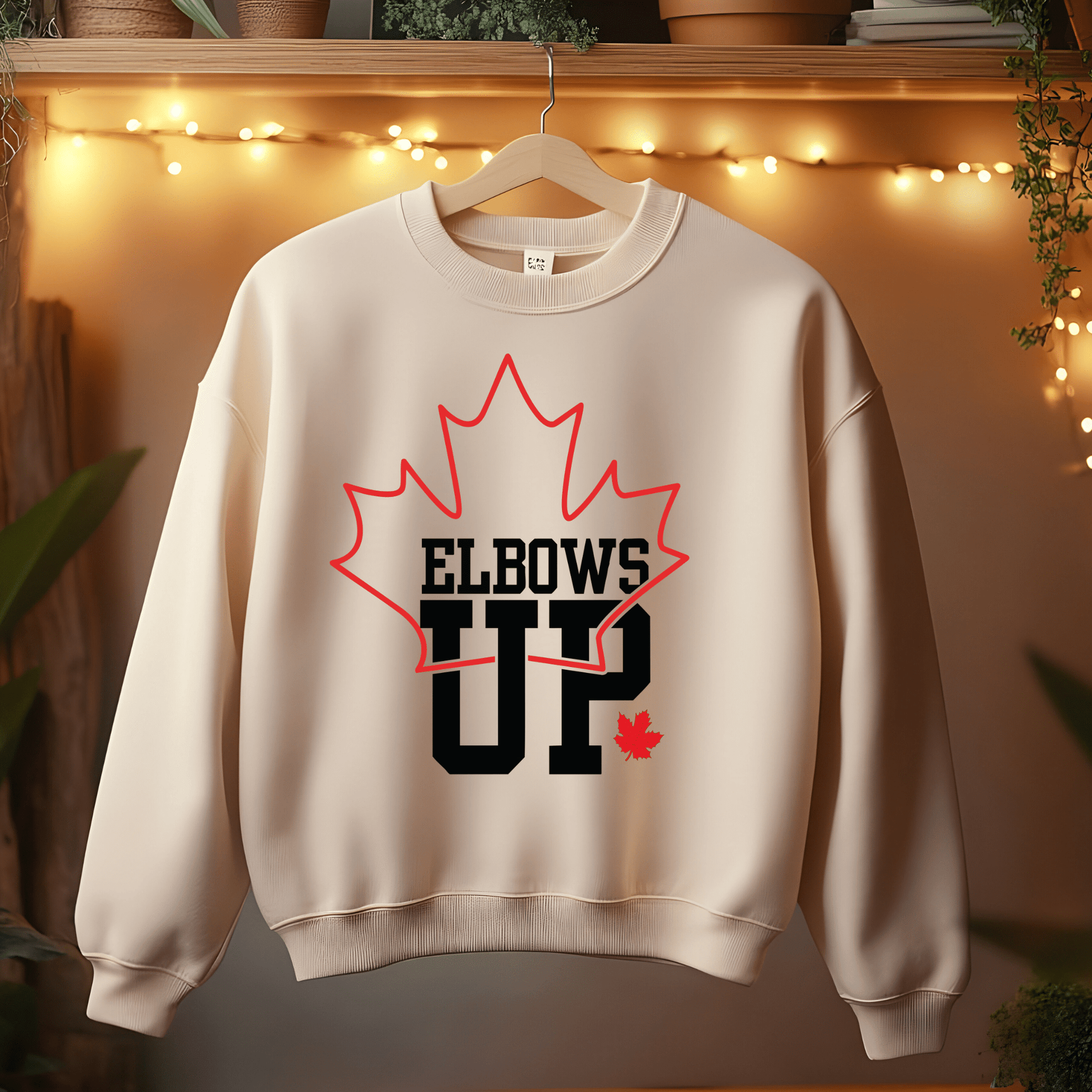 Ink and Charms Designs Sweatshirt "ELBOWS UP" Apparel Collection: Wear Your Canadian Pride with Strength!