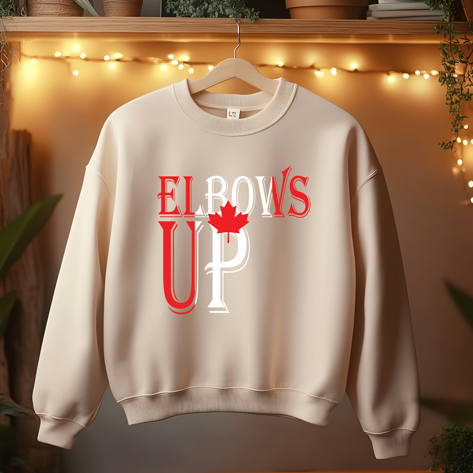 Ink and Charms Designs Sweatshirt "ELBOWS UP" Apparel Collection: Wear Your Canadian Pride with Strength!