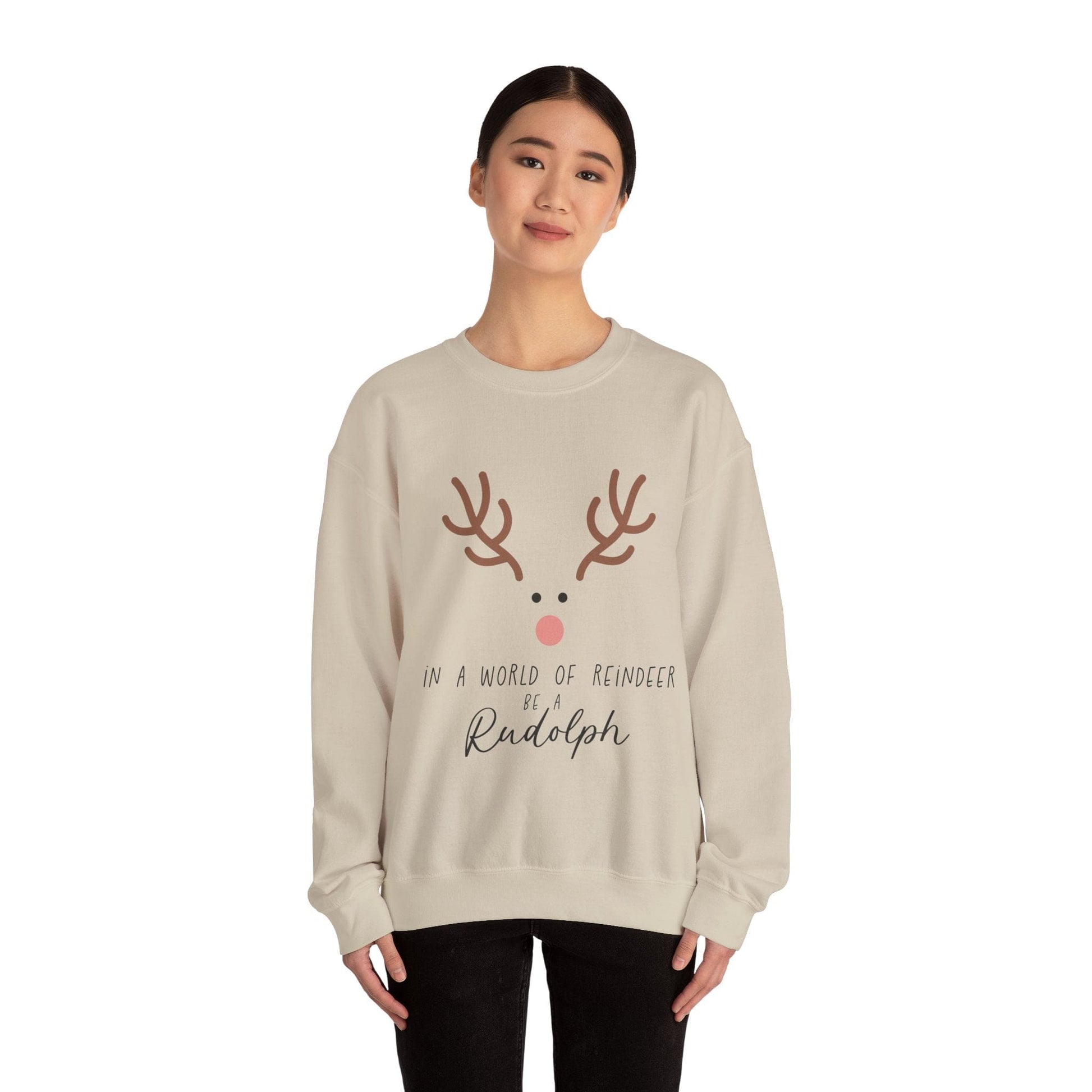Ink and Charms Designs Sweatshirt Cute in a world of Reindeer be a Rodolph Unisex Sweatshirt