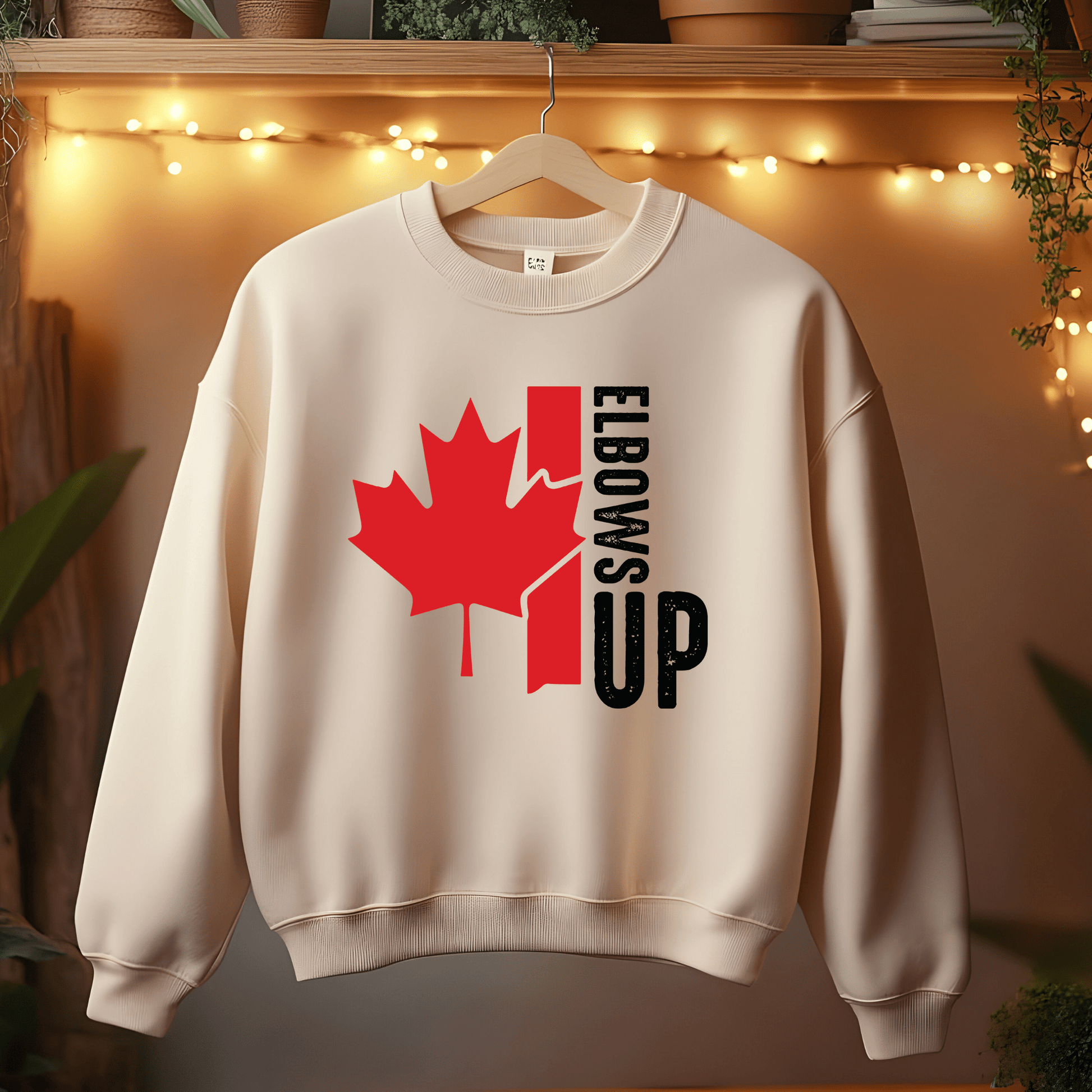 Ink and Charms Designs Sweatshirt "ELBOWS UP" Apparel Collection: Wear Your Canadian Pride with Strength!