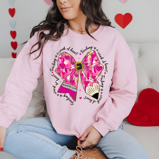 Ink and Charms Designs Sweatshirt Pink / S Glitter Bows, Hearts, and Pencil Valentine’s Day Sweatshirt- Teaching is a Work of Heart